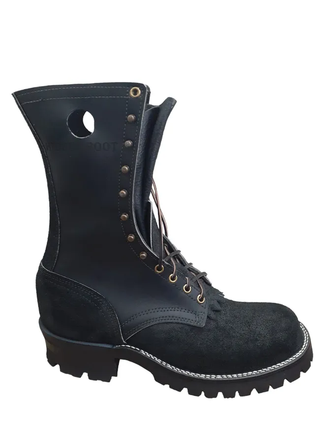 A single tall black lace-up logger boot with a rough-out foot, a smooth shaft, a high heel and a lugged sole, on a white background.